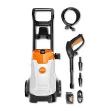 STIHL RE90 pressure washer with hose, spray gun, and various cleaning attachments in white and orange