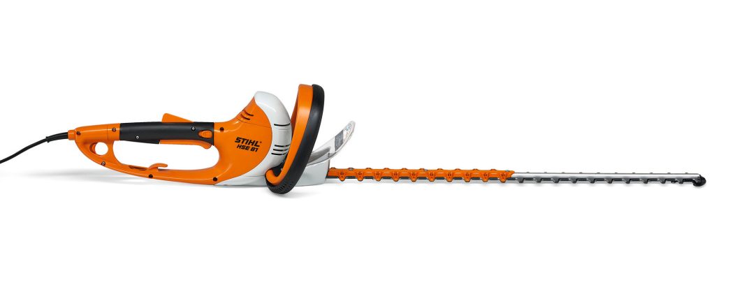 HSE 81 hedge cutter for sale with long orange and black cutting blade and ergonomic handle