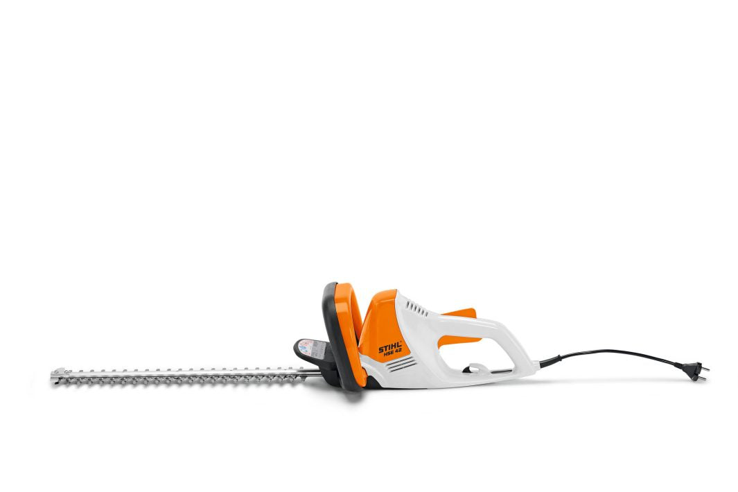 STIHL HSE42 hedge trimmer with electric cord and sharp dual-action blades for precise trimming