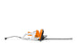 STIHL HSE42 hedge trimmer with orange and white body and long cutting blade on white background