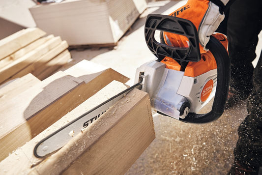 STIHL MSA200 chainsaw for sale cutting through wooden plank with sawdust flying