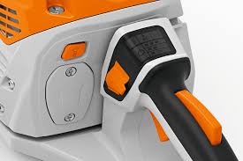 Close-up of STIHL MSA60C chainsaw for sale showing the handle and control switch in orange and black